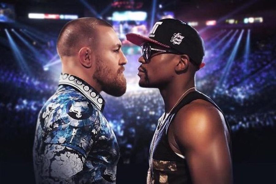 Conor McGregor and Floyd Mayweather pose for a picture weeks before the fight. 