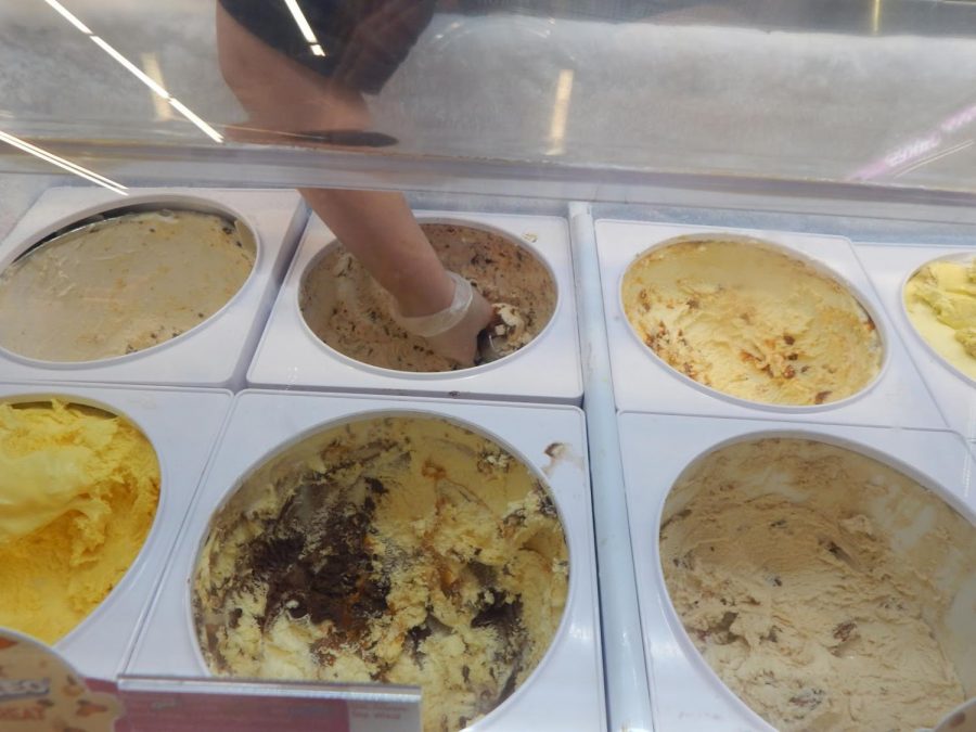 Baskin Robbins workers scoop Trick Oreo Treat Ice Cream