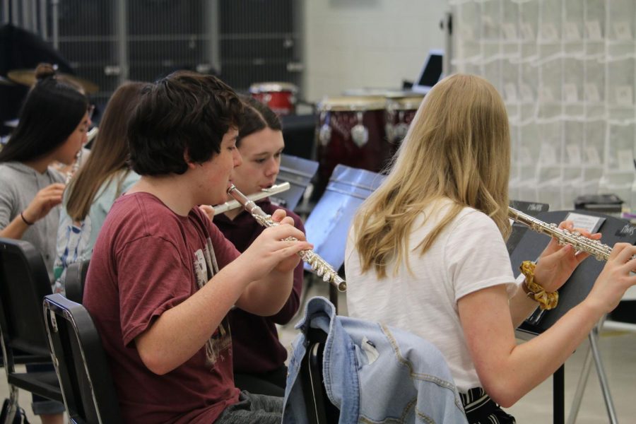 Junior Alexander Martinelli practices the flute for the Millard West Band. He started playing the flute in elementary school and has kept with it since. "It feels really nice to have a skill that you have improved," Martinelli said. "If you find a song that's interesting and you know the instrument, then sometimes just playing through it is really fun." 