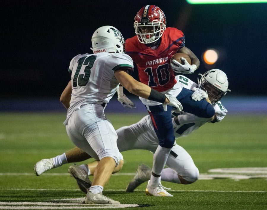 Souths Harris is tackled by James Conway and Trey Wilbeck for West