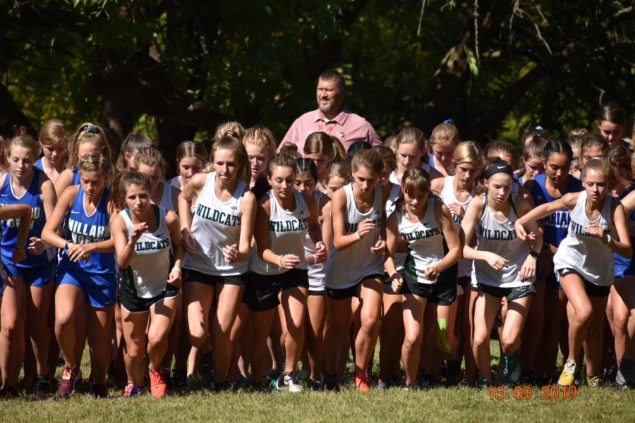 The Wildcats girls ready for their race. The runners all wanted their times close together and to run together so they would do better in their race. "During our race we wanted to work on pack running," Beaudin said. "We were trying to work on getting our times closer together."