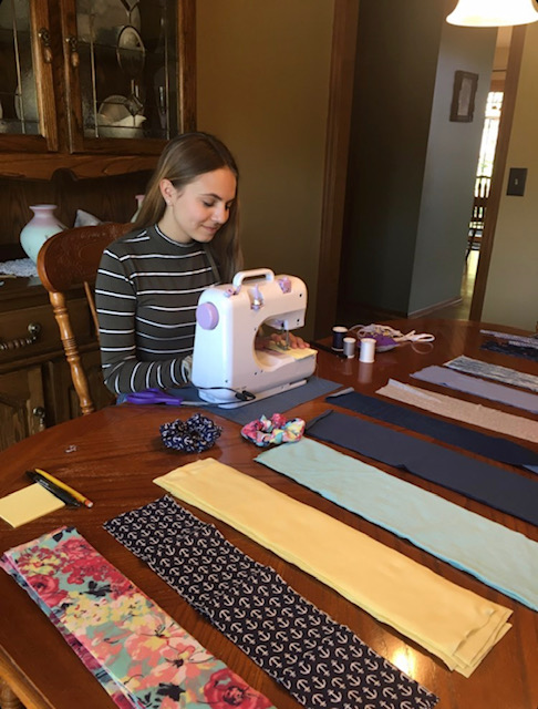 When+one+enters+the+Zieg+household+its+not+uncommon+to+see+junior+Emily+Zieg+working+diligently+on+sewing+scrunchies+for+her+business+ScrunchEEZ.+Zieg+gained+interest+in+sewing+during+middle+school%2C+but+she+didnt+start+producing+the+scrunchies+until+this+year.+All+of+my+friends+were+really+excited+when+I+told+them+I+was+going+to+start+this+business%2C+Zieg+said.+They+all+wanted+me+make+one+for+them+and+pay+me+for+it%2C+which+I+thought+was+really+cool.