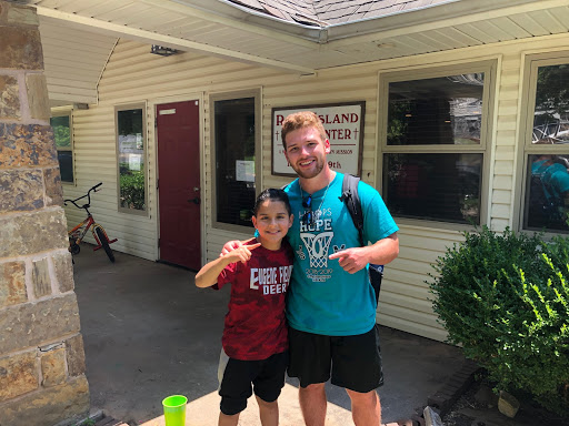 pictured above is Burton with one of his new friends he made on his mission trip.