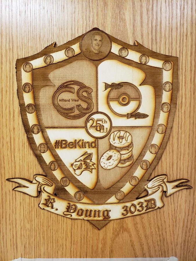 The Computer Science teacher Ramsey Youngs QT Crest was displayed for the school