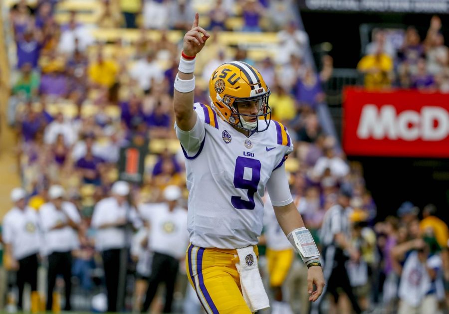 Joe Burrow celebrates a play for the LSU Tigers. Burrow has led them to the number one ranking and is top three in the country for every passing stat.