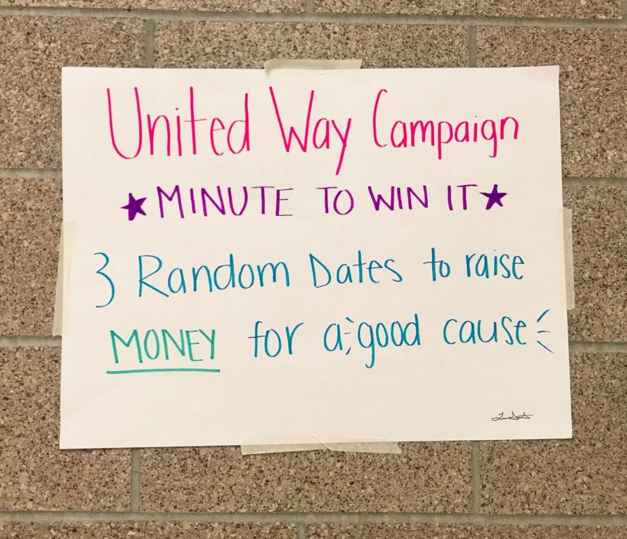 Posters made by Key Club are hung around the school to advertise the United Way campaign.

