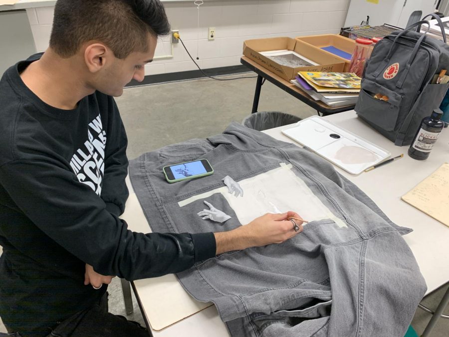 In the Advanced Studio class, students are granted a number of freedoms. It allows student’s imagination to run wild and think and execute ideas normally not done in lower level art classes. Senior Aryan Naik has let his creativity shown by painting the back of his denim jacket with the famous painting The Creation of Adam by Michelangelo. “This is by far the project I’m most excited for,” said Naik. “The freedom of this class has really allowed me to express myself fully in this class.”