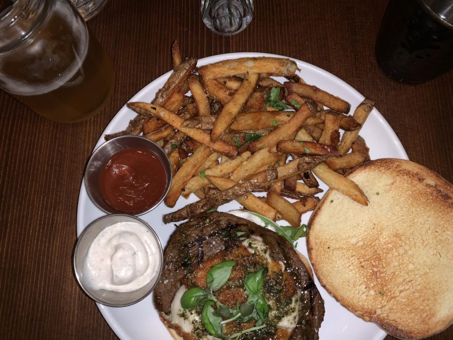 The Pesto Mozzarella Burger is made with the lentil seitan patty, fried mozzarella, pesto, arugula and garlic aioli in a toasted potato bun. I chose the fries for my side, but there were also options of potato salad and a house salad. The condiments included a sweet ketchup and an added ranch by request.