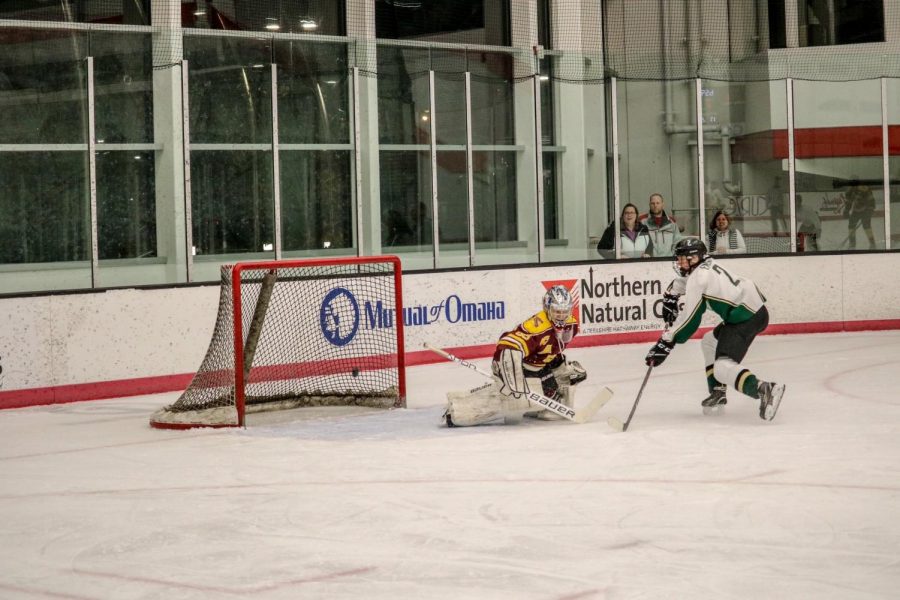 Senior captain Neil Emert buries a goal against Papio. Emert is second on the team in points.