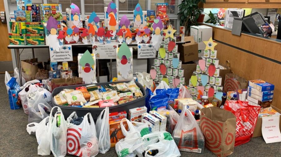 Donation items were collected in the counseling office to be taken to the Project Wee Care facility to be distributed to local families in need. “This year, NHS donated spaghetti sauce, noodles, and hamburger/chicken helper as part of the overall donation drive,” Kosziek said. “Last year, Millard West as a whole donated over 1000 items to the Project Wee Care facility.”