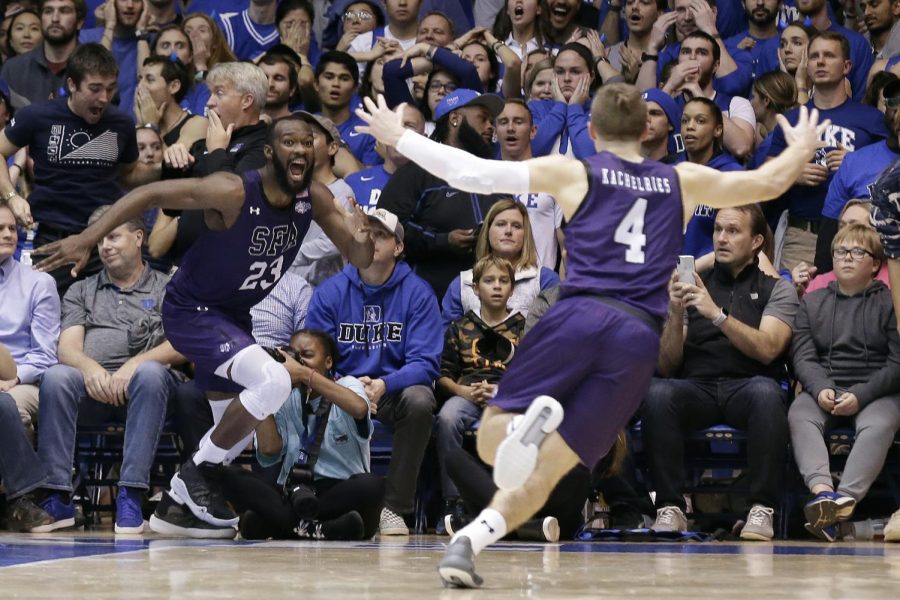 Stephen F. Austin's Nathan Bain celebrates his game winning buzzer beater against number one Duke. The Lumberjacks are currently Duke's only loss.