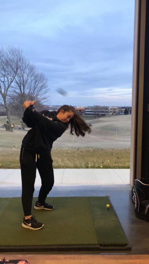 On+Wednesdays%2C+sophomore+Madison+Harvey+practices+to+get+better+at+her+swing.+She+had+a+great+time+spending+time+with+friends+and+getting+better+at+golf.+%E2%80%9CPlaying+virtual+golf+helps+a+player+to+keep+their+swing+consistent+in+the+off+season%2C%E2%80%9D+Harvey+said.+%E2%80%9CYou+are+less+likely+to+forget+your+swing+habits+in+your+off+time+as+well.%E2%80%9D%0A