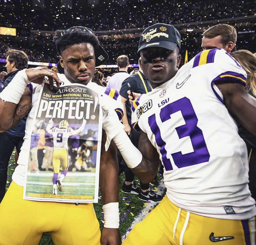 LSU wide receivers Jontre Kirklin and Ja’marr Chase celebrate winning the national title. Chase totaled over 200 yards receiving against Clemson. “We were the bigger dog in the fight,” Chase said. “We at the top of the mountain now.”