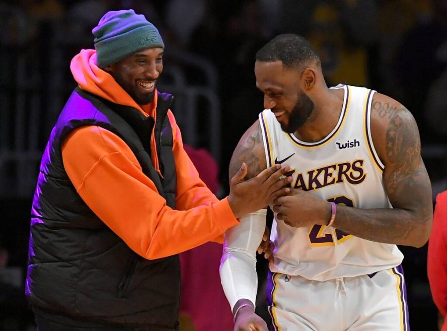 Lakers forward LeBron James banters with the late Lakers legend Kobe Bryant in a game earlier this season. Bryant passed away in a tragic helicopter crash with his daughter and seven others, just the morning after LeBron passed him for the number three spot on the all time scoring list. 