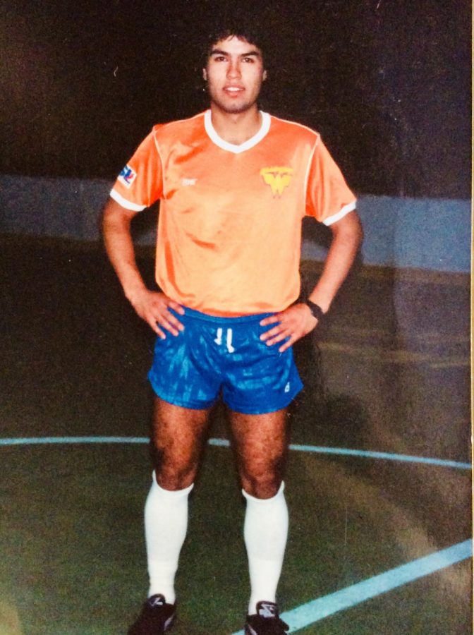 Spanish teacher and soccer coach, Juan Agurrie poses in an indoor soccer complex for his club team in the United States. He played indoor professional soccer for the Witchita Wings, in Witchita Kansas. “When I first moved to the United States in 1991 the soccer league was much less developed than it is now,” Aguirre said. “Back then soccer was just starting the develop”

