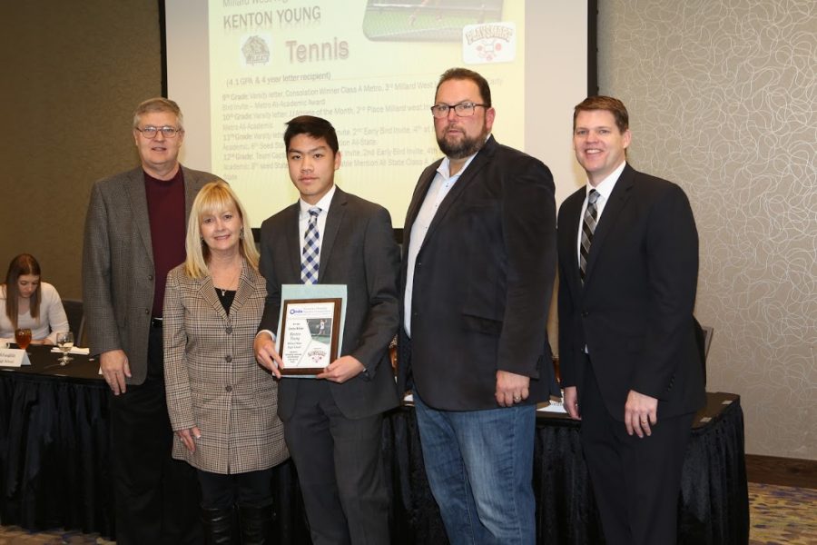 From left to right: Stu Pospisil, MJ Robertson, Kenton Young, Derek Leathers, Andy Kendeigh
Caption: Senior Kenton Young receives the fall Scholar Athlete Award during a luncheon on January 14th. “The award was a little bit of a surprise because I wasn’t sure I was going to get it,” Young said. “My school tennis coach, Coach Koziol, nominated me for this award and the Greater Omaha Sports Committee picked me for the top scholar-athlete in boys tennis.”