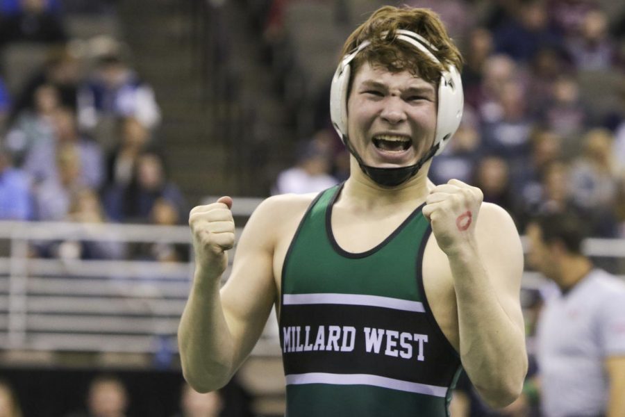 
Senior Nate Hartman celebrates after a 
win against Omaha Burke. Hartman 
finished sixth in the State tournament. “A Lot of work went into my season this year. I traveled across the country with the Nebraska National this summer competing in places like Tulsa, Oklahoma to Fargo, North Dakota. I trained everyday at MWC Wrestling Academy, watched my diet to get down to weight, and did hundreds of hours of physical therapy recovering from a dislocated shoulder. My training partner throughout my whole career has been Wyatt May. I wouldnt be where I am today without him pushing me to reach my goals.”