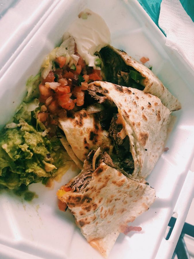 Steak Quesadilla Fajita. It is filled with steak, cheese, peppers and onions. It was delicious and very appetizing.