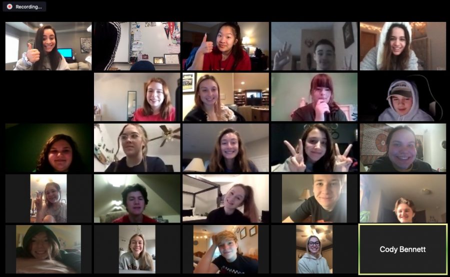 Journalism+students+seen+collaborating+with+each+other+through+the+video+chatting+app+Zoom.+