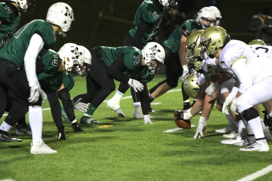The Millard West defense waits anxiously for the snap against Elkhorn South in last year’s second round matchup against the Storm. The Wildcats beat the Storm in this game 35-21. “I was really proud of how far we got as a team last year,” senior running back Zach Coleman said. “I wouldn’t trade last season for anything else.”