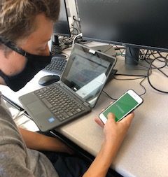 Junior Joseph Ebmeier opens the synergy app in his advanced Journalism class. He is looking to access his academic records to see his GPA. Synergy is a great app but quite the change from infinite campus. I like a lot of the new features and apps it has, and how its set up.