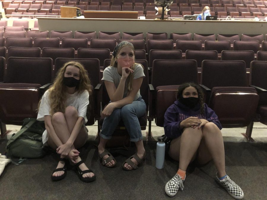 Seniors (from left to right) Josie Maw, Kody Horrocks and Ahnysia Jackson watch the Cabaret. During this time members of the department viewed the completed compilation of students’ videos. “I am super happy that this event was still able to happen,” senior Drama Club Historian Kody Horrocks said. “This gave us hope that this year could still have many opportunities for us even if they aren’t “normal.’’’
