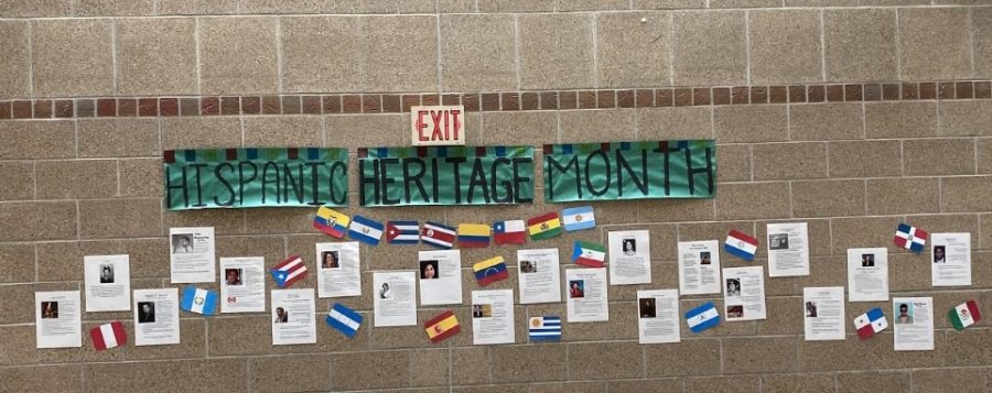 The wall in front of the library honors Hispanics throughout history. Many different Latinos/as are displayed along with their stories and accomplishments. “As a Latina, when creating the posters of important people for Hispanic and Latino Americans, I found it to help me better my sense of connection to my community,” senior Delaney Akins said.”While researching, I found figures who helped stand up to racial injustices and overall help progress American society forward.”
