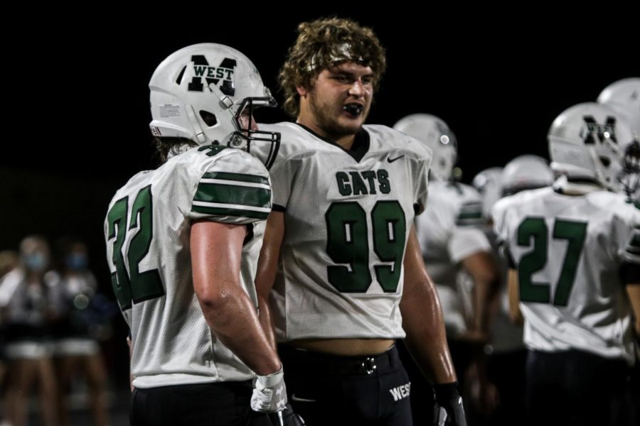 Senior linebacker Brecken Wallace and senior defensive lineman Tyler Jett discuss the next plan for defense. “All year being a leader on the field and trying to control the defense was my job.” Jett said. Millard West faces Millard South this Friday in the second round of the playoffs.