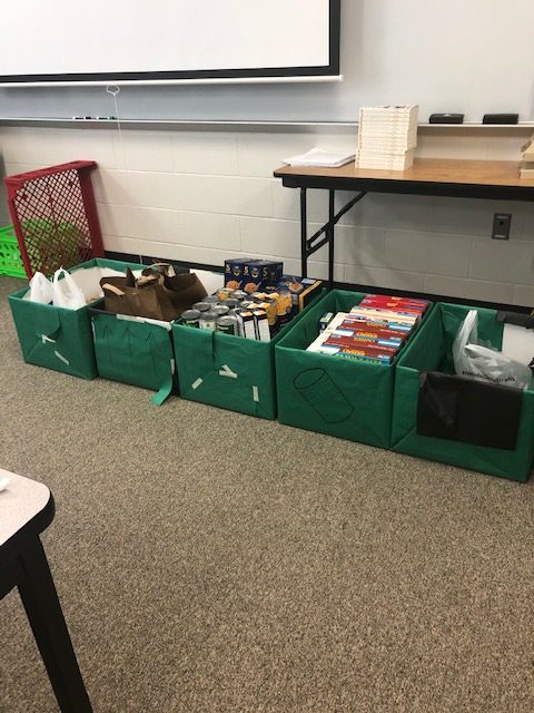 DECA collected 5 full boxes of food to give back to those in need this Thanksgiving