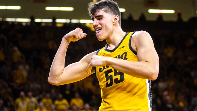 Senior Iowa Hawkeyes center Luka Garza flexes after an and-one bucket in a game against Penn State. The preseason National Player of the Year has led the Hawks to a fifth overall ranking in the preseason AP Poll. “I don’t think there’s any way he can work harder,” said Head Coach Fran McCaffery. “He’s the hardest working player I’ve ever met.”