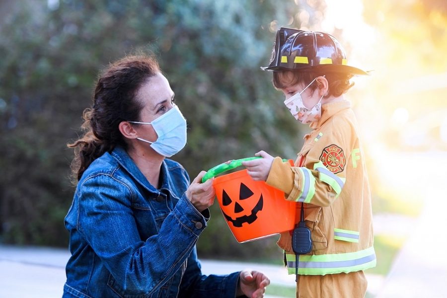 this picture shows people wearing masks and being safe for this holiday 