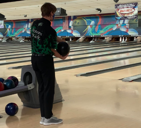 Kirk gets set for his next turn to bowl. He competed in game one and scored a 149, as well as helping the team to a combined score of 172 in the Baker game. In the Baker game the team was able to work well together giving them the final points they needed to secure the victory. “Our teams work really well together,” Smith said. “They cheer each other on when theyre bowling well, and they encourage each other if someone is struggling. Their attitudes are a big factor of their success.”