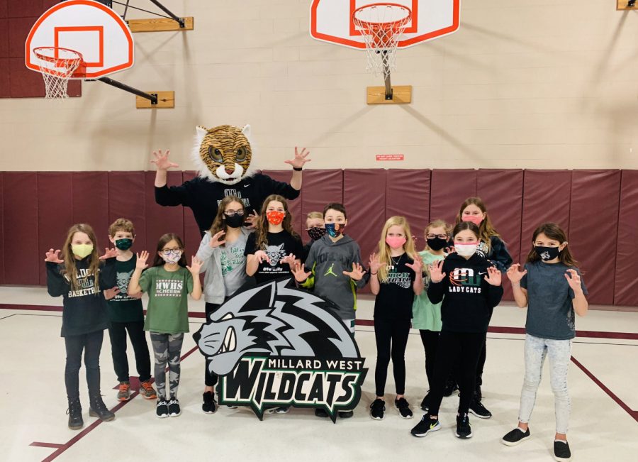 Rohwer PE students stand together showing off their Wildcat apparel. 