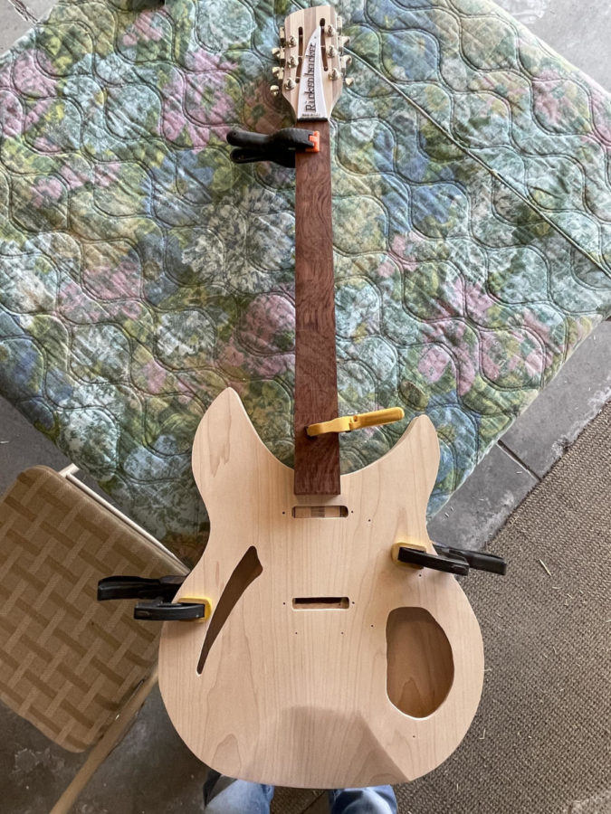 Clamping+all+the+wood+pieces+together%2C+senior+Thomas+Detlefsen+wanted+to+get+an+idea+for+how+his+guitar+would+look+semi-completed%2C+without+using+glue.+He+just+finished+sanding+the+body+of+the+guitar+and+had+few+more+things+to+add+to+it.+%E2%80%9CHere+I+finished+sanding+on+my+body+and+decided+to+dry+clamp+all+my+wood+pieces+together+without+any+glue+along+with+a+few+pieces+of+hardware+to+get+a+rough+idea+of+what+the+guitar+would+look+like+when+it%E2%80%99s+finally+complete%2C%E2%80%9D+Detlefsen+said.+%E2%80%9CAfter+the+whole+process%2C+it+was+satisfying+to+finally+see+it+come+together+and+start+to+look+like+a+finished+project%2C+especially+one+that+so+closely+resembles+the+original+guitar+it%E2%80%99s+based+on.%E2%80%9D