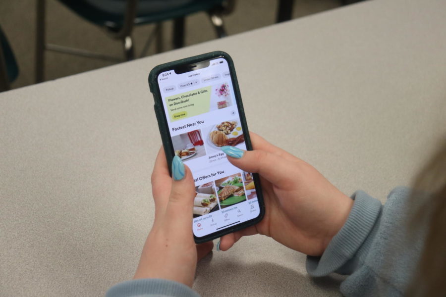 Junior Annabelle Harshbarger uses the DoorDash app to order breakfast using contactless delivery. “I like to order from DoorDash because it’s easy and super convenient.” 