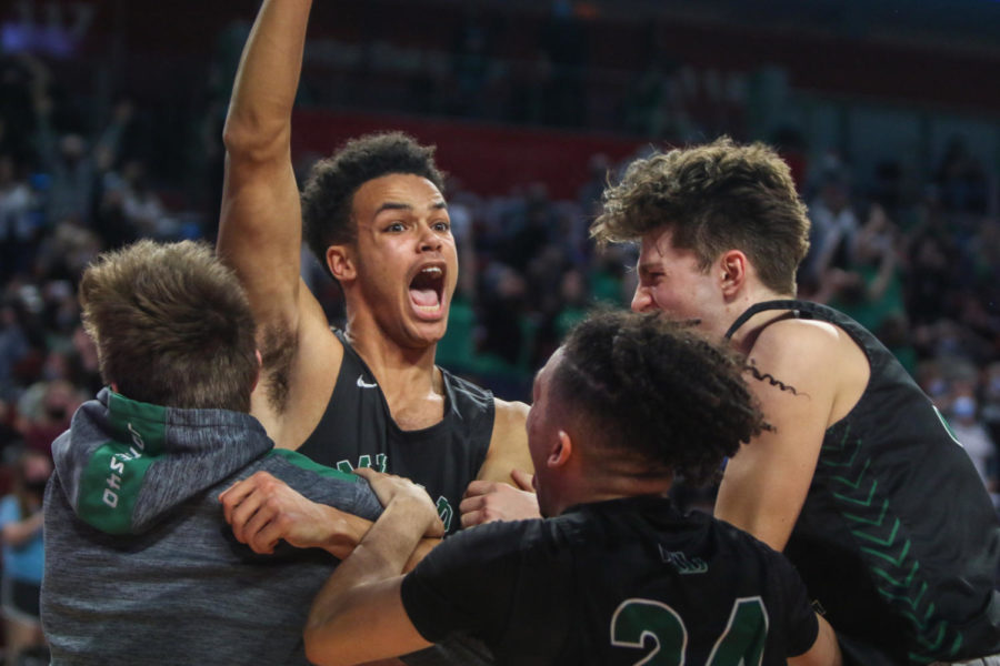 Senior Forward Evan Meyersick celebrates a quarterfinals win after his game-winning shot Tuesday night at Pinnacle Bank Arena in Lincoln, Nebraska. The Wildcats beat Lincoln Pius X 47-45.