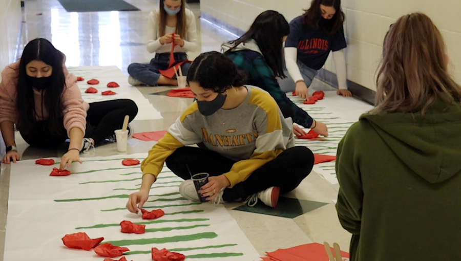 Students continue a Millard West tradition of creating poppy fields in the English hallways during French week. Both members of French club and students enrolled in French class take control of planning and creating activities. “I hope that people look forward to it every year,” French teacher and club sponsor Sarah Karst said. “We see it as an opportunity for the appreciation of the language and simply a celebration of the beauty of the language and the many cultures that accompany it.”