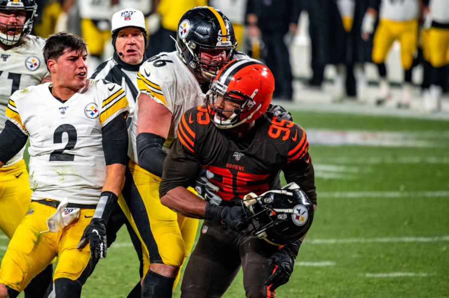 In what is now an infamous moment in NFL lore, Browns end Myles Garrett (95) took the helmet off of Steelers quarterback Mason Rudolph (2), and swung it at his head, resulting in a direct blow. Garrett was suspended indefinitely, and many other suspensions were issued. Photo by Creative Commons.