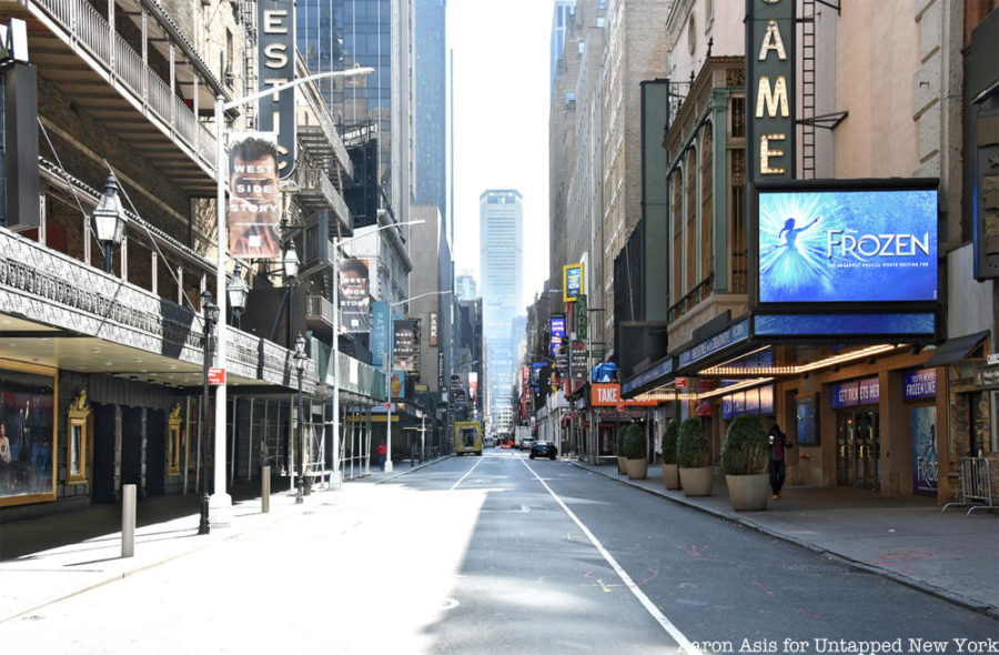 New York City’s Broadway, usually buzzing with tourists, artists and activity, remains lifeless during the pandemic. 