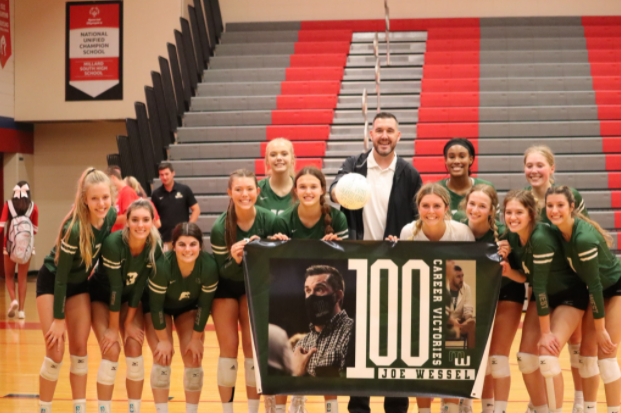 Head coach Joe Wessel and his team pose for photos after winning his 100th career game. Win number 100 did not come easy as it was against a fierce rival and one of the top teams in the state. “It was a battle from start to finish,” Wessel said. “Our goal was to stay aggressive, follow the game plan and let things fall into place. We have to maintain confidence, grit and our mental game to continue on the path we set forth to accomplish at the beginning of the season.”