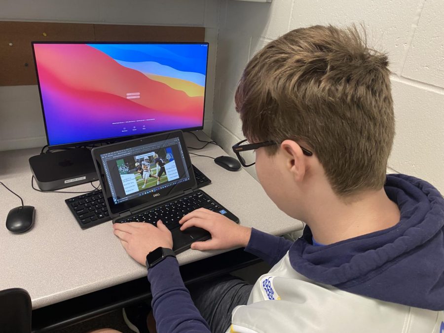 Sophomore Logan Moseley works to create a graphic for the STRIV TV live stream.  The graphics are important to the live stream as they provide stats and information about the players.