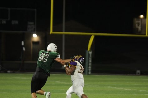 Senior tight end Trace Thaden laying the hammer on a monster stiff arm for a huge gain.