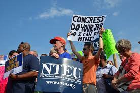 Many American lives are put on halt because of government shutdowns. In the image above, federal employees are protesting outside the capital of the U.S. because of the furloughing.
