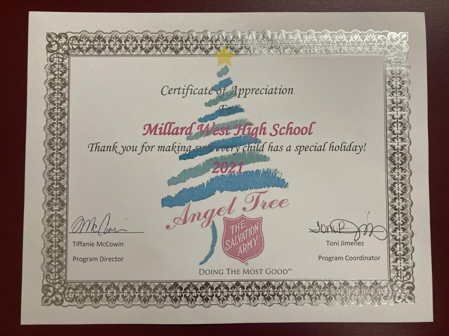 Director+Tiffanie+McCowin+and+Coordinator+Toni+Jimenez+of+the+Salvation+Army+Angel+Tree+Program+awarded+this+certificate+of+appreciation+to+Millard+West+to+show+their+appreciation.