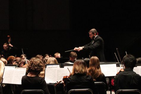 Samuel Zeleski conducts the orchestra show after spending 3 months working with the students.