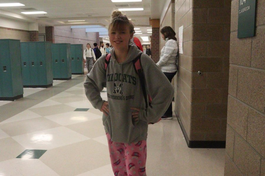 Sophmore Olivia Orr getting comfortable for Christmas pajama day.