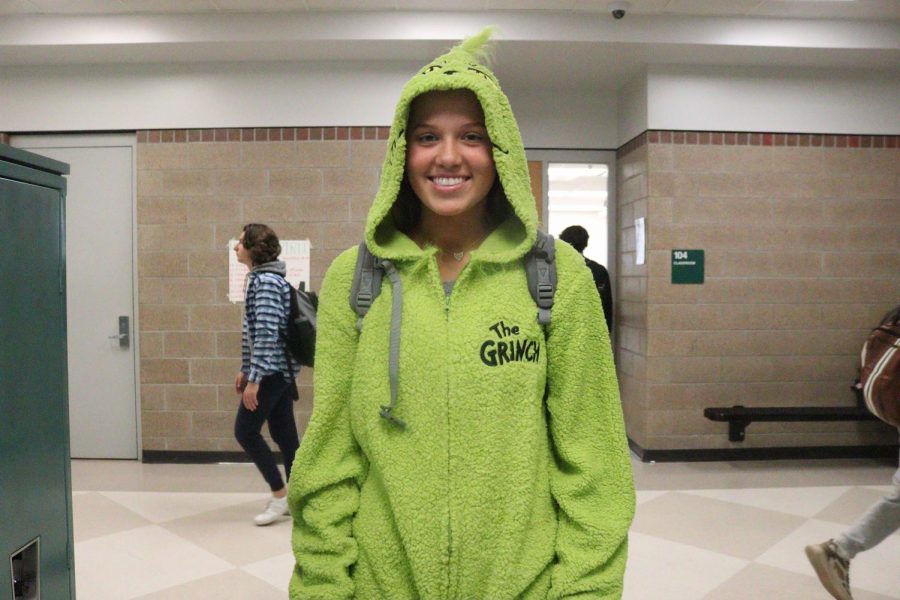 Participating in character day, senior Madeline Fontana embraces her inner Grinch. 