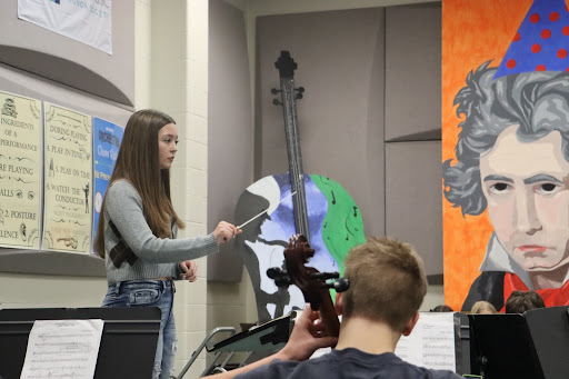 Spending her second block practicing conducting a piece of music for the Philharmonic Orchestra, senior Sophia Ollis has taken on a new role. Ollis was given the opportunity to pick a piece of music for the group to perform during their winter concert. “The biggest challenge that I’ve faced throughout the time I’ve spent working on this piece was figuring out which gestures to use while conducting,” senior Sophia Ollis said. “Since the most important part of conducting is conveying the emotion of that particular piece, I had to consider everything from the movements I make with my hands to the facial expressions I use in order to emote what the piece is supposed to say.”