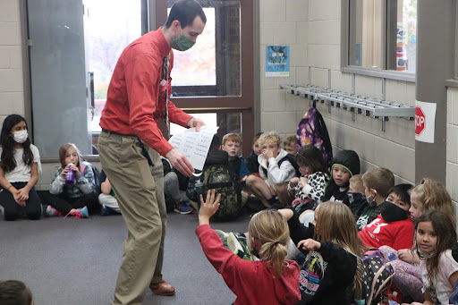 The Millard West Spanish Honors Society (SHS) helps run a Spanish club for third graders at Willowdale Elementary. Young students are introduced to the language and culture by participating in a number of activities. “The SHS students run the different stations and teach the third graders the lesson,” Spanish Honors Society sponsor Alexander Jameson said. “We have four stations and the kids rotate around every eight to 10 minutes. We always have a culture station and then three Spanish language stations.”