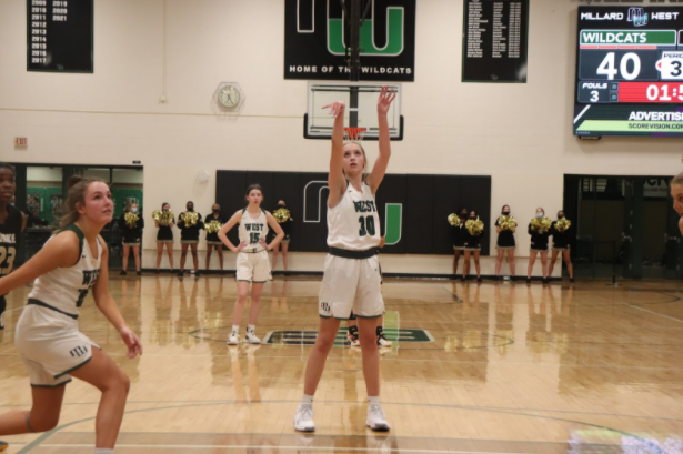Freshman+Norah+Gessert+shoots+a+free+throw+late+in+the+third+quarter.+Gessert+totaled+10+points+as+well+as+a+rebound+and+assist.+The+big+win+gives+them+confidence+as+they+get+ready+for+a+big+rivalry+game+against+Millard+South.+%E2%80%9CThe+girls+know+we+can+compete+with+anyone+in+the+state%2C%E2%80%9D+head+coach+Marc+Kruger+said.+%E2%80%9CWe+just+havent+been+able+to+break+through+and+finish+off+a+really+good+opponent.+Hopefully+this+game+can+serve+as+a+lesson+that+we+cant+take+possessions+off+and+need+to+be+ready+to+play+our+brand+of+basketball+for+all+four+quarters.%E2%80%9D